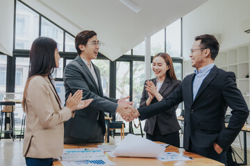 business related meeting Asian Business Team Discusses Strategy for Starting a Financial Process Analysis Project Successful Asian businessman working on a plan