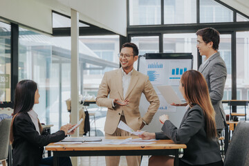 business related meeting Asian Business Team Discusses Strategy for Starting a Financial Process Analysis Project Successful Asian businessman working on a plan