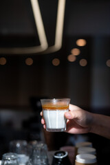 glass of coffee with milk on the table