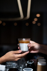 glass of coffee with milk on the table