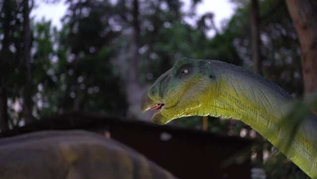 Therizinosaurus has steam coming out of its mouth. A predatory dinosaur with hypertrophied claws. The strongest of the dinosaurs that lived at the end of the Cretaceous period. High quality 4k footage