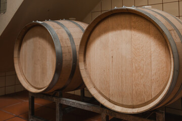 Wooden Barrels in a Winery Cellar