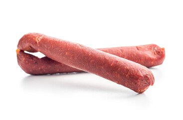 Smoked salami sausages isolated on white background.