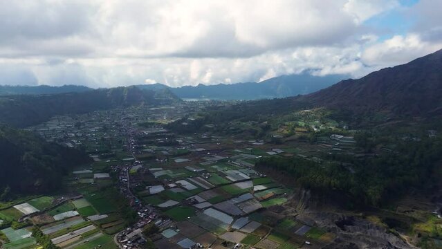 Aerial drone view of Pinggan village, a place to catch the best sunrise in Kintamani, Bali, Indonesia