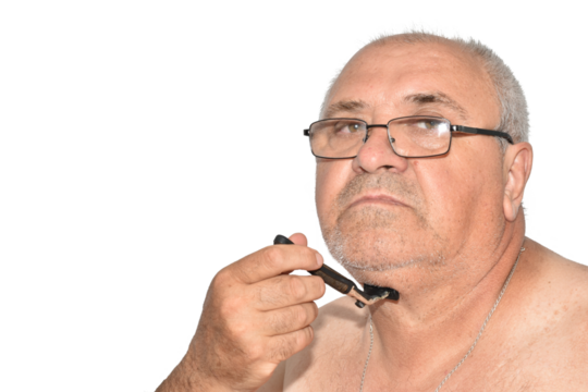 A man tries to shave his neck with a machine.