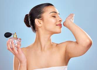 Perfume, fragrance and woman with wrist smell for clean scent and beauty salon aesthetic in studio....