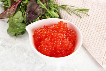 Red caviar in the bowl