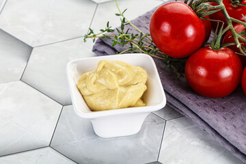 Dijon mustard sauce in the bowl