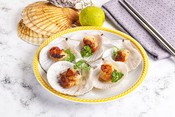 Grilled scallops shell with butter