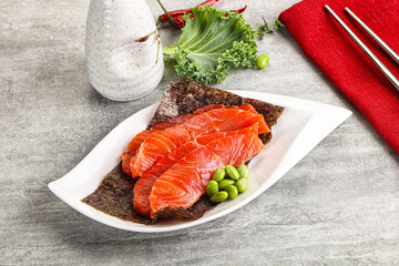 Sliced salmon sashimi in the plate