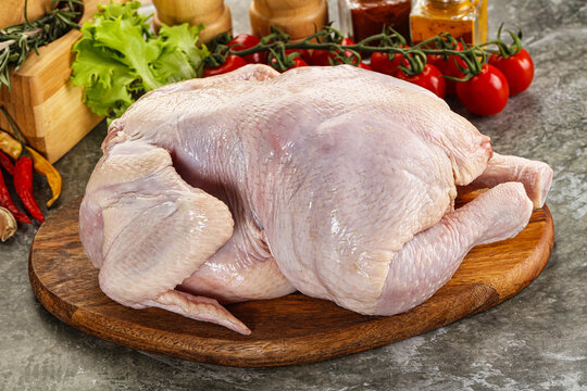 Raw whole chicken for cooking