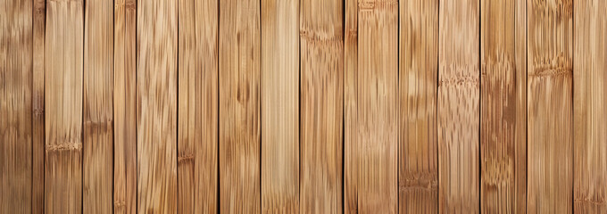 Obraz premium Bamboo wood texture background, top view. Light brown bamboo surface with vertical lines for decoration and design of furniture, tables or floors.