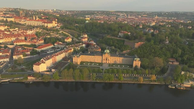 Prague, Czech Republic - The Straka Academy (Strakova Akademie) Located on the Left Bank of the Vltava River - Aerial Drone Shot