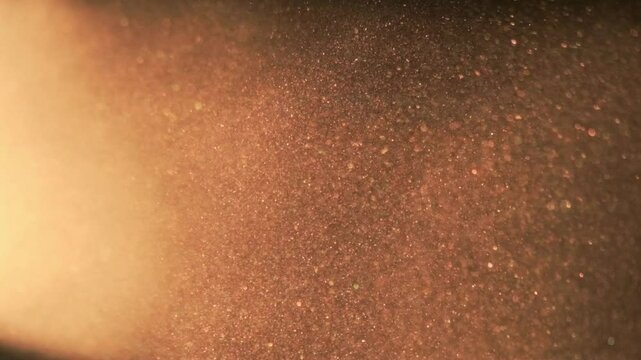 Golden morning light filtering through dust particles suspended in the air