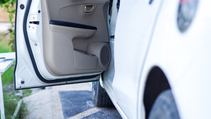 Fototapeta premium car stoped with open door in carport.