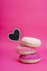 Handmade crocheted donuts with shiny beads. Festive Valentines or Mothers Day, greeting card