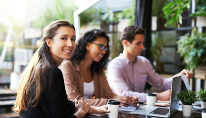 Business people, coffee shop and portrait of woman in meeting with laptop for planning, discussion and research. Creative agency, teamwork and men and women for project, review and collaboration