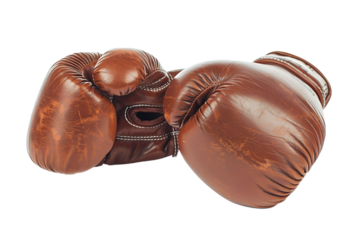 Red old boxing gloves, isolated on transparent background. Sport professional equipment in combat sport with punching and blocking