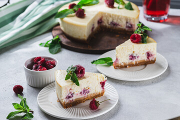 cheesecake with raspberries on a plate