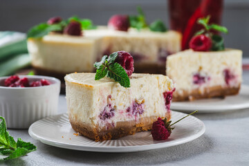 cheesecake with raspberries on a plate