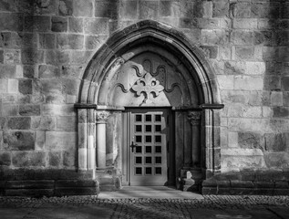 the wooden door of old church