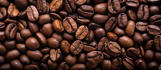 Obraz premium Coffee beans that have been roasted make a suitable backdrop for a copy space image