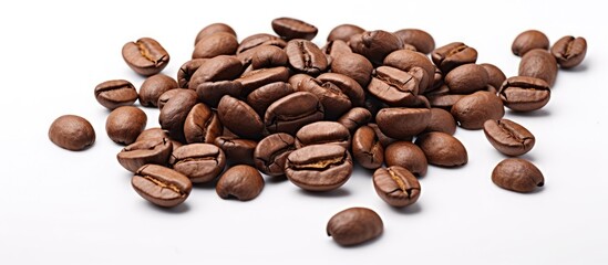 Naklejka premium Dark coffee beans float on white backdrop with copy space image