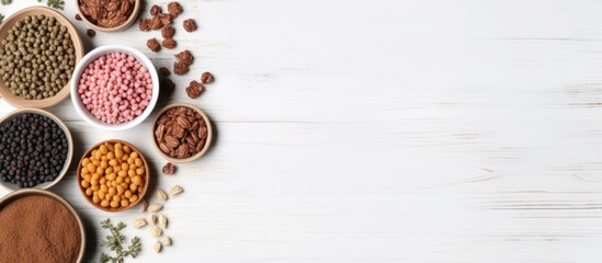 Top down view of pet accessories with dry dog and cat food alongside toys with an available copy space image