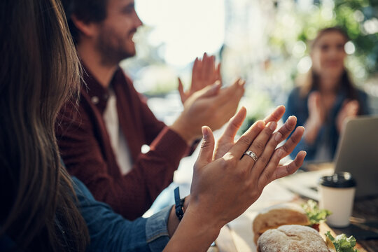 Happy people, hands and meeting with applause for team building, well done or thank you at cafe. Closeup of young employees clapping for congratulations, celebration or collaboration at coffee shop