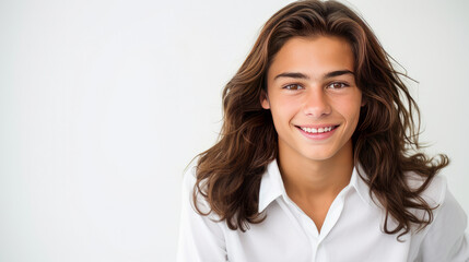 Fototapeta premium Happy cheerful young latino generation z. Smiling funny ethnic cool generation z teenage student, long hair, white background.