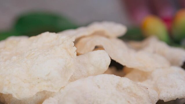 Emping crackers are typical Indonesian crackers which are often served as snacks. Emping crackers are a snack made from melinjo fruit or joint fir