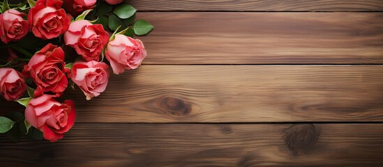 Roses and home decor showcased on a wooden backdrop with copy space image