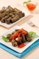 Dolmades. Vine leaves stuffed with rice and tofu.