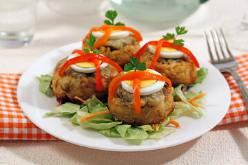 Potato nests with artichoke cream.