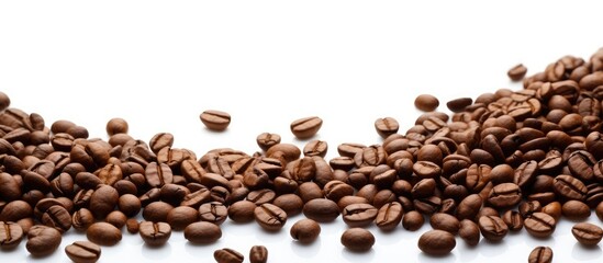 Ground and whole roasted coffee beans and fresh beans in a white background with space for text. Copy space image. Place for adding text and design