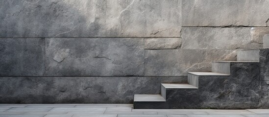 Stairs made of granite and a wall constructed from concrete create a solid backdrop for a copy space image