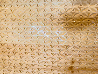 Close-Up of Decorative Wood Carving Pattern. Detailed Handcrafted Wooden Texture Background..
