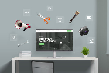 Web design studio with flying tools and web page icons around computer display featuring concept agency page. Creative illustration of digital workspace