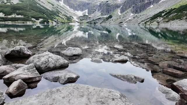 A pond located under the peaks of Orla Perc in Poland.