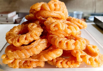 Indian Sweet Imarti at Shop, A circular shaped dessert