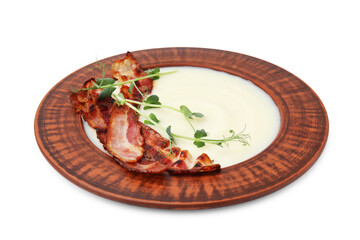 Delicious potato soup with bacon and microgreens in bowl isolated on white