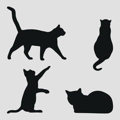 Black silhouettes of cats. Pet. Vector on a gray background