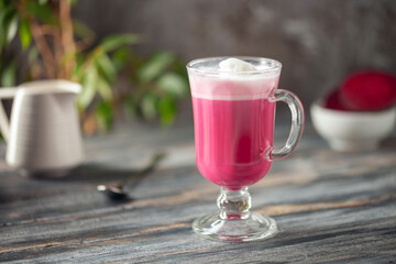 Vegetable drink. Healthy beetroot latte  on table.