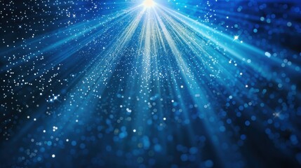 Fototapeta premium A bright blue sky with a light shining down on it. The light is scattered in the sky, creating a sparkling effect