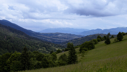 Obraz premium Picturesque mountain landscape with clouds