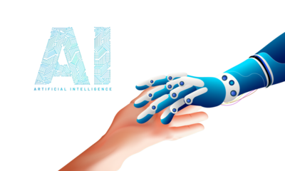 Futuristic concept for artificial intelligence and virtual world. Robotic hand and human hand connecting with AI text made by computer generate digital structure.