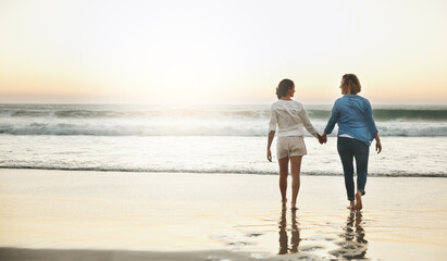 Back, couple and walking in water, lesbian and holding hands of women, vacation and love in beach. Summer, travel and waves in sea, holiday and peace of people, lgbtq and trust in adventure of date