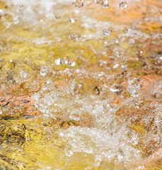 Splashes of water in a fountain in the park
