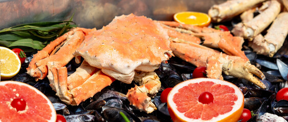 Dish with crab, mussels and fruit © schankz