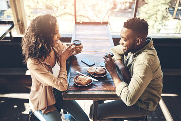 Happy, date and couple with food at restaurant for conversation, nutrition and bonding together. Man, woman and smile in love with coffee at cafe for breakfast, beverage and romance in morning